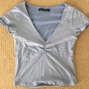 Light blue top with white flowers